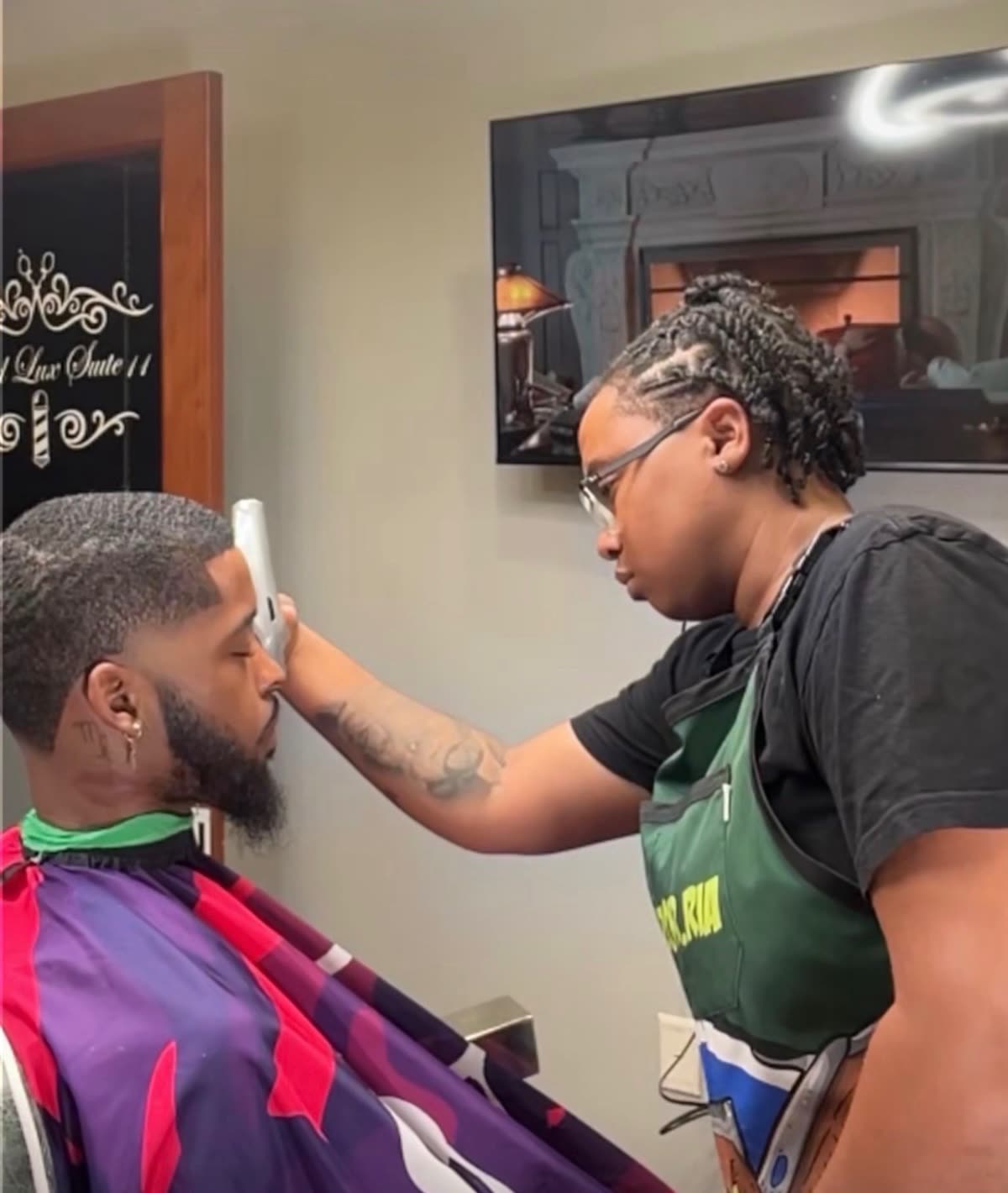 Barber now, cutting hair in the shop